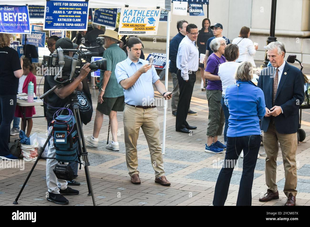 TV news crew interviews a member of Congress