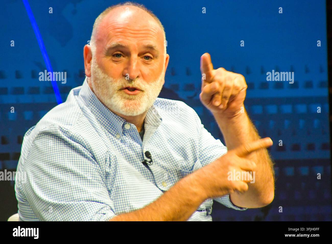 José Andrés, seated and gesturing